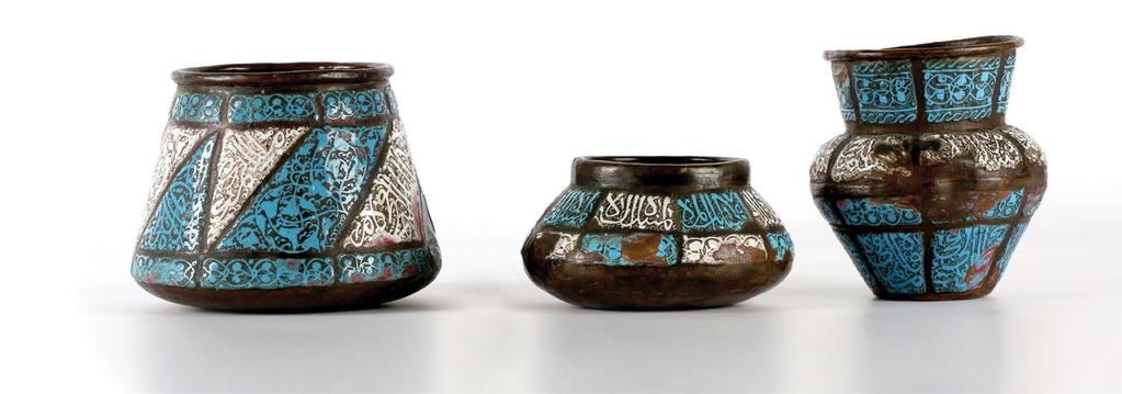 A pair of Sarraf Enamel Mina Copper Basins وعاءان نحاسيان "مطليان باملينا" من الصراف decorated with floral and foliage motifs galzed in blue, green, pink and white.