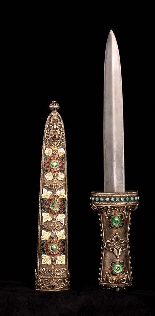 131 Russian Orientalist Letter Opener فتاحة رسائل روسية من الفن اإلستشراقي With turquoise stones inlaid in the handle. Green foliate, red circle, yellow and white quatrefoil enameling.