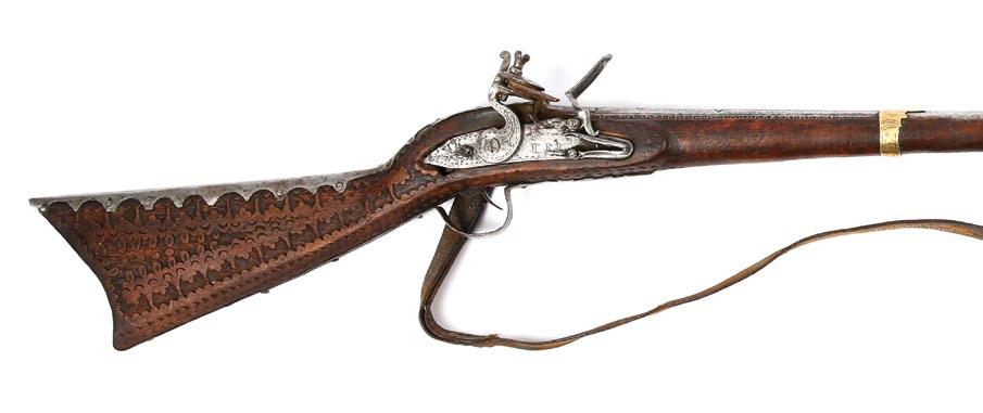 153. An Ottoman Shishana Rifle, 17th - 18th Century بندقية عثمانية "شيشانة" من أواخر القرن ١٧ أو أوائل القرن ١٨ مرصعة بالعاج والسبطانة من اجلوهر كما أنها مختومة بإسم الصانع علي 154.