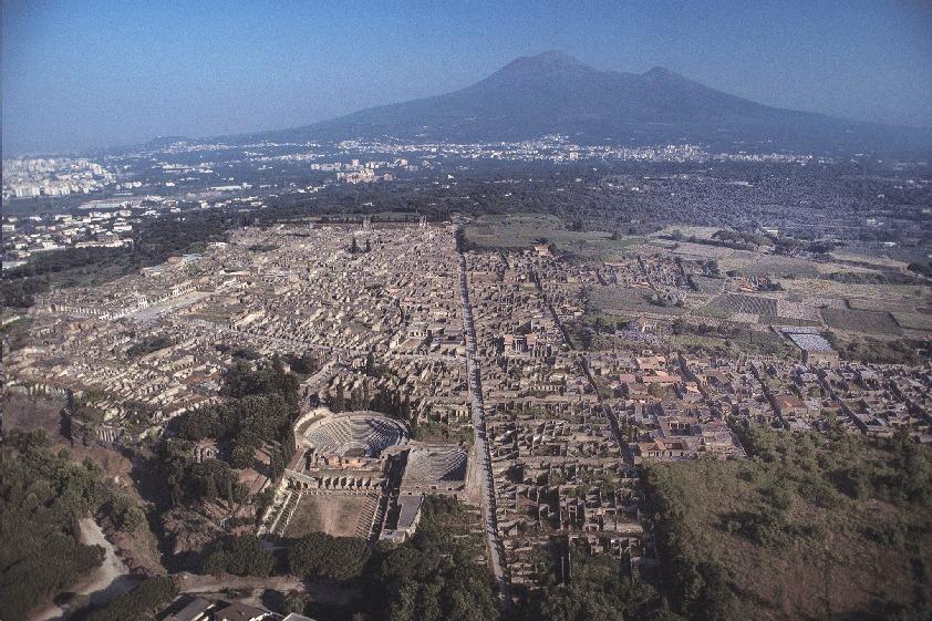 The Town of Pompeii (Stage 3) Write the answers in full sentences on the lines. 1. How far is Pompeii from Mount Vesuvius? 2. Why did rich Romans like to have houses in Campania? (Give two reasons.
