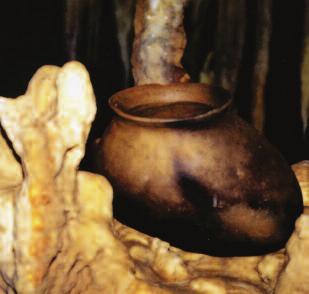 Belize; (d) shoeshaped pottery vessel, Actun