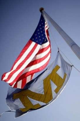 The Moeller flag, along with the American flag, flies high at the 'Michael A. Stofko Memorial Field at Archbishop Moeller High School.