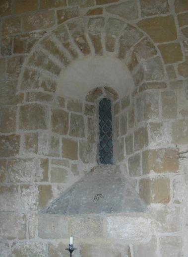 this window now simply links the two parts of the church. The great thickness of the wall is apparent.