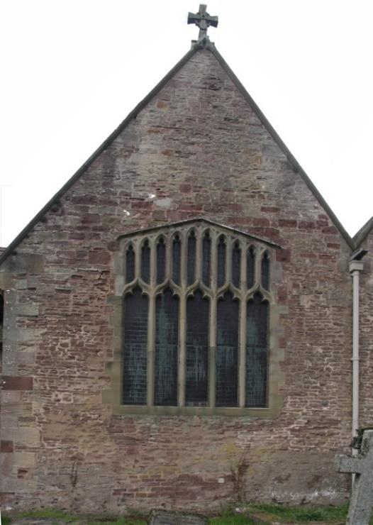 9. THE EAST WALL - SOUTH WINDOW In 1927, this window was considered to be late 15th-century, though parts of the window had been restored.