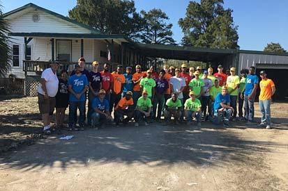 They spent their time removing sheetrock, flooring, interior wood, and personal possessions from homes of families affected by the recent flooding.
