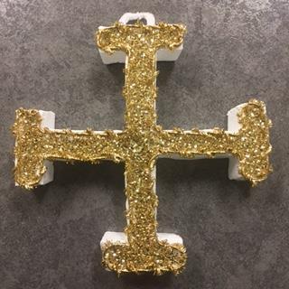 Cross Potent: The Savior s spiritual and physical healing powers are represented by this