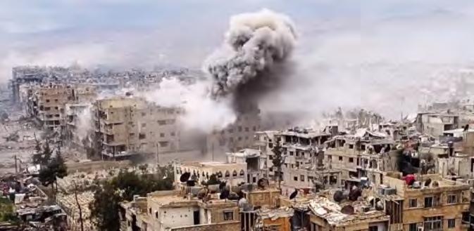 It shows artillery fire and airstrikes against ISIS targets in the Yarmouk refugee camp.