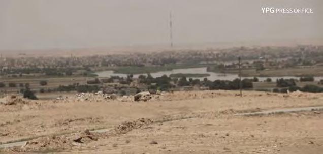 7 Right: The village of Al-Baghouz on the Euphrates River.