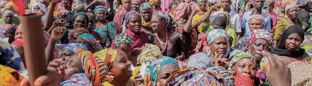 The Famine In Africa INSIDE NIGERIA ONE OF THE FOUR COUNTRIES AFFECTED BY A DEVASTATING FAMINE Image: Women waiting for food distribution in Nigeria.