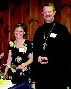 16 25 2 2004 H A P P E N I N G S Parish honors diocesan priest on his return from Kuwait BLOOMINGTON- NORMAL, IL Shortly after Pascha, the parishioners of Holy Apostles Mission here celebrated the