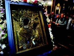 Upon its arrival in Moscow, the Tikhvin icon was greeted by Patriarch Aleksy and Metropolitan Herman at the