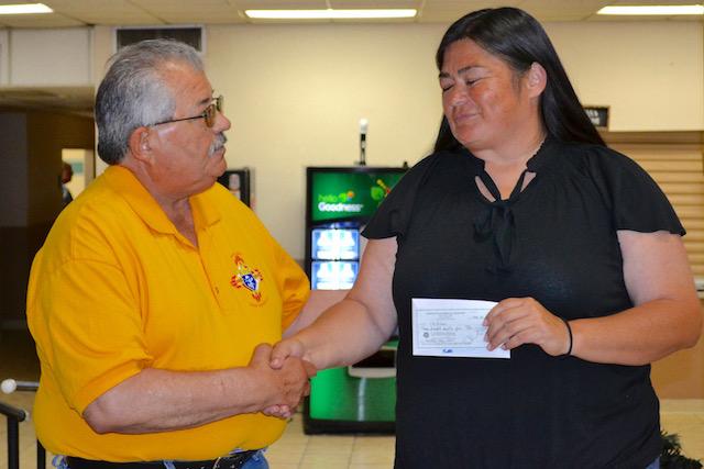 Jesus Frietze, Mother s Day Dinner Dance Chairman, presents our check to Pat Acosta from La Casa Brother Jesus presented a second check for $375 to Flor Gonzales from La Pinon 2018 Mega Bingo