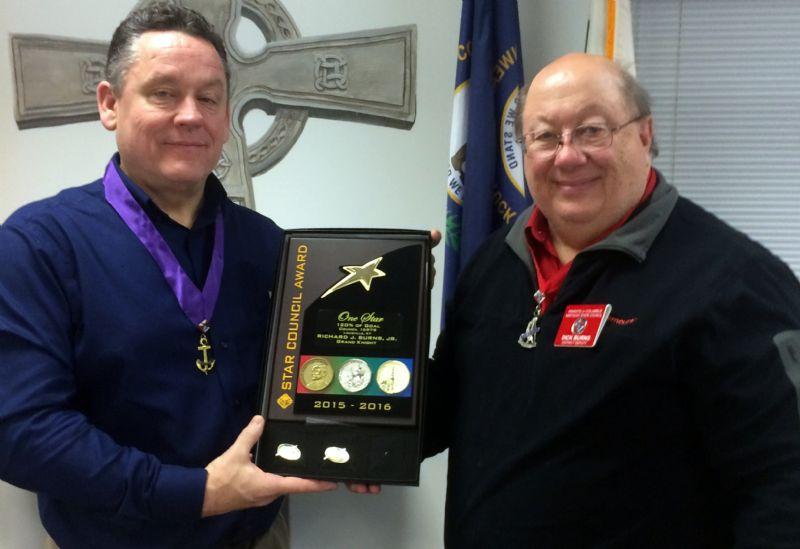Star Council District Deputy and IPGK Dick Burns (right) presents the STAR Council Plaque for 2015-2016 to GK Michael Saylor (left) of St Margaret Mary Council #15979.
