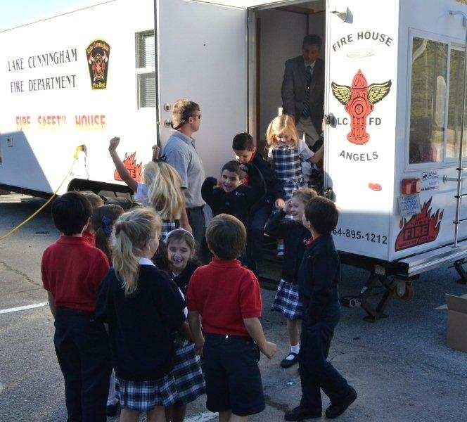 Students in K4, Kindergarten and First grade enjoyed a visit from the Fire Department this week that included a tour of a fire truck.