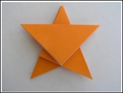 Make a Simple Christmas Star Leave the front flap of the star unglued to draw a picture