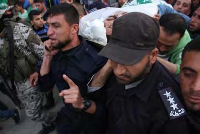 20 Operatives of the Palestinian police in the Gaza Strip and Hamas' military wing at the funeral of Majdi Shabat (Twitter account of Shehab, April 6, 2018). Hussein Muhammad Adnan Madhi City.