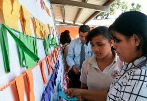 Students in Medellin, Colombia, pray on March 7 during a division-wide day of prayer in Adventist schools. [photo courtesy IAD] Mar.