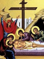 As the priest proclaims the Gospel, And Joseph took the body, and wrapped it in a clean linen shroud, and laid it in his own new tomb he removes the Body of Christ from the Cross, wrap it in a new