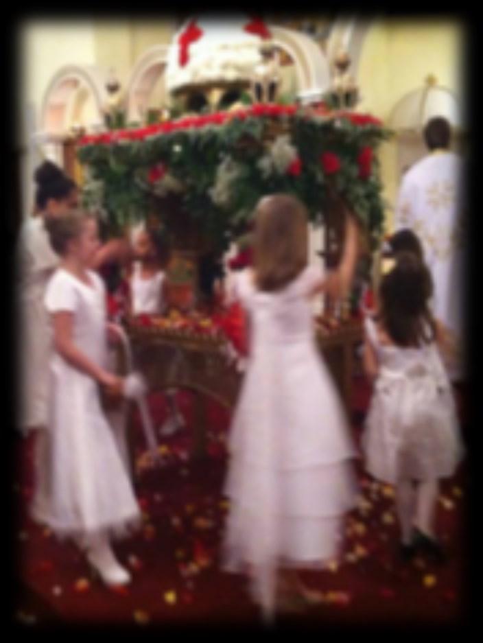 Young girls representing the myrrh bearing women adorn the tomb of Christ with rose pedals during the lamentations THE LAMENTATIONS On Holy Friday evening, we sing the Orthros of Holy Saturday,
