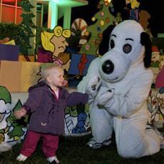 3 AP Snoopy greets 1-year-old Raeghan Thompson at the relocated "Snoopy House" display on the lawn outside City Hall in Costa Mesa, California GARY MONAHAN: ''My phone was ringing off the hook, the