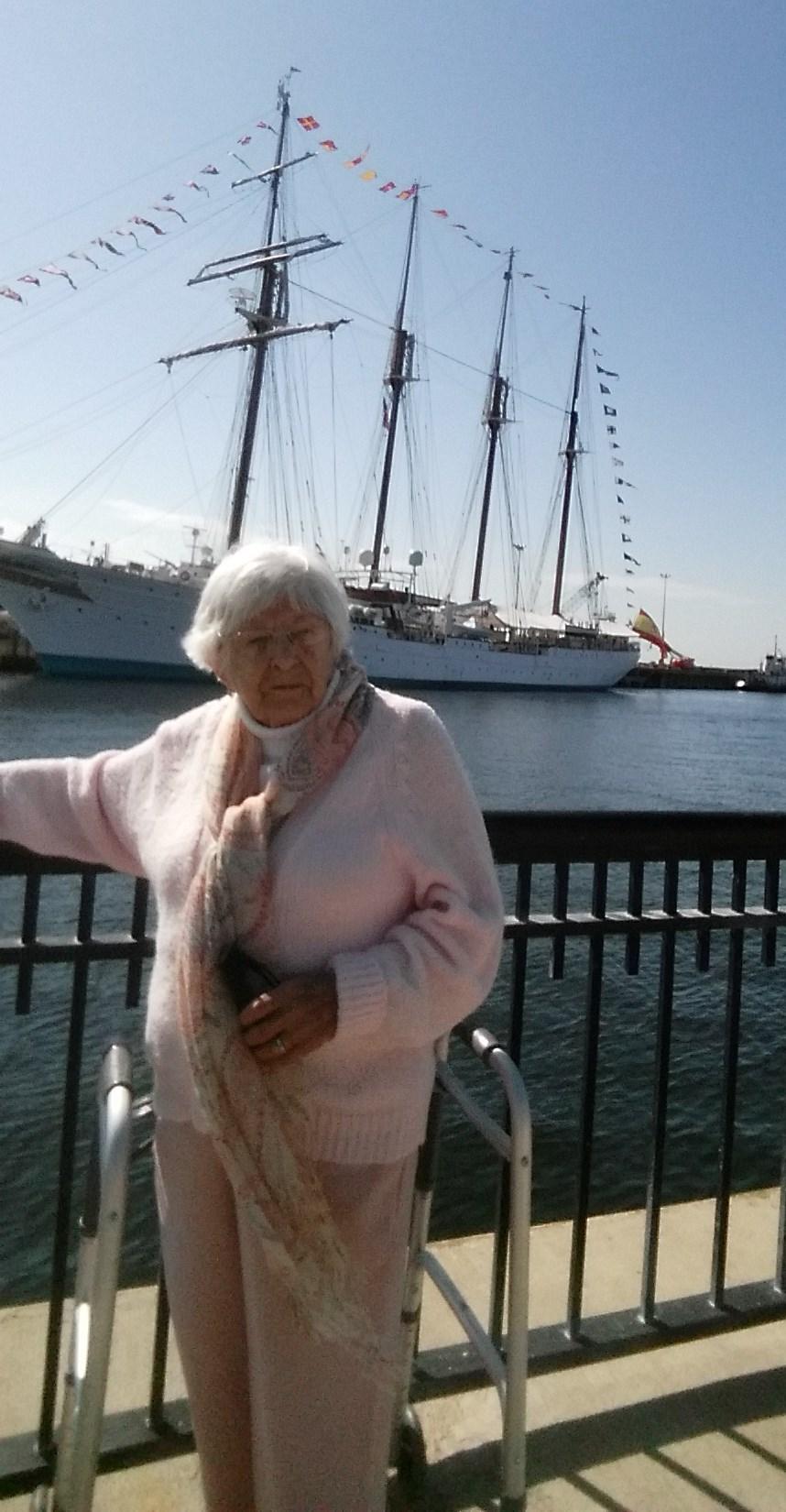 Bubbe or Granma Martha Miller and visiting Royal Spanish Navy training vessel, the De Elcano, in Pensacola, Floria.