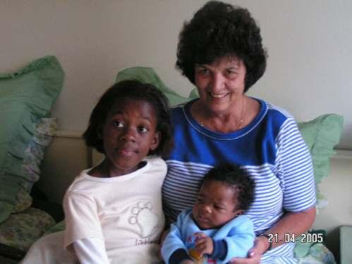 Mary Brown and her grandchildren, as she calls them, Sheena and Gabriel, in South Africa. The picture was taken on 21 April 2005.