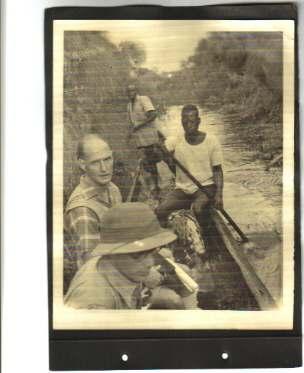 Vanessa's father Kasper Hocking, second from front, in the canoe with his colleagues on a tse-tse-fly patrol near Mwanza in the late 1950s.