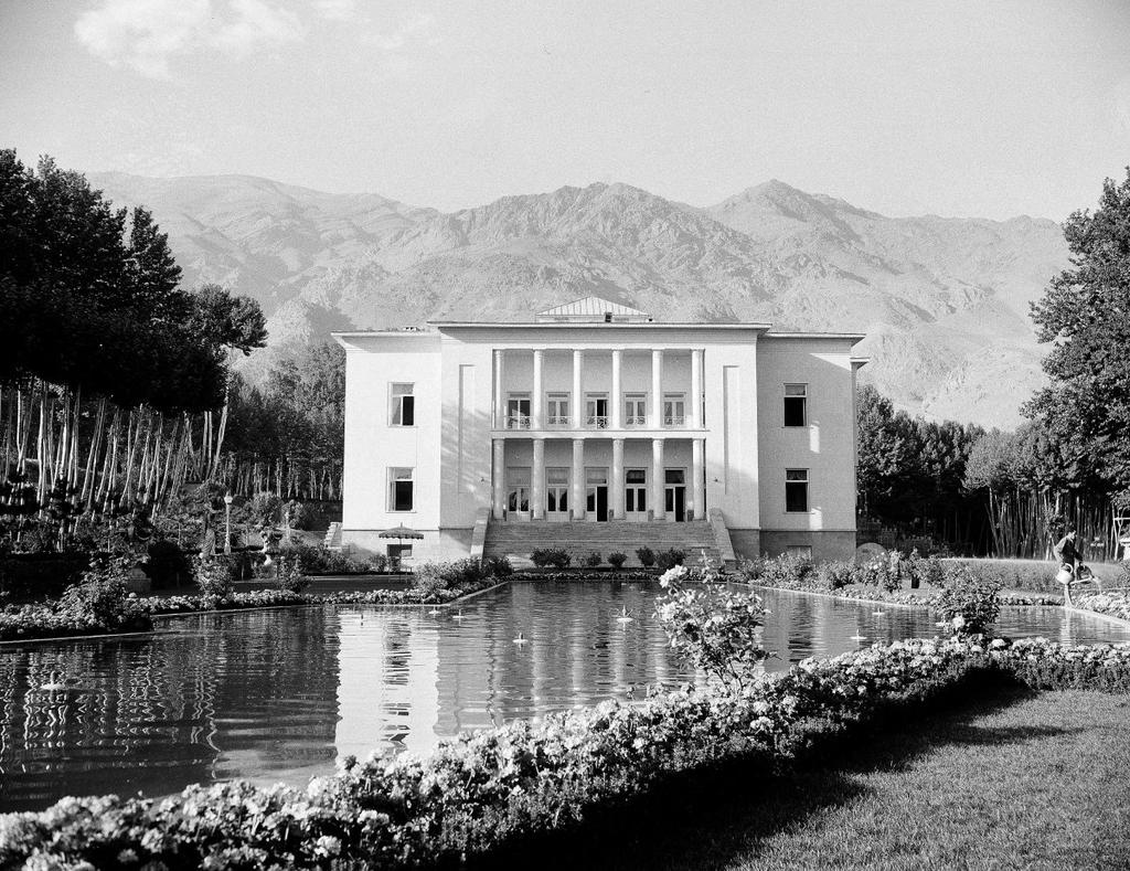 This is the White Palace of the Shah of Iran at Saadabad, Tehran, as it looked in August 1953, after the government upheavals.
