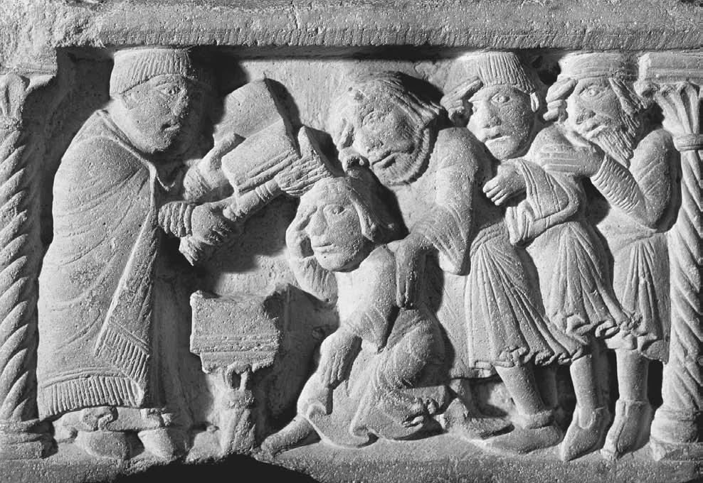 Bishop performing exorcism, bas relief of font, Modena Cathedral, Museo Civico, Modena, Italy, 13th century. THE ART ARCHIVE/MUSEO CIVICO, MODENA/DAGLI ORTI.