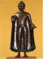 The Buddha s figure is modelled in a subtle manner suggesting, at the same time, the thin quality of the cloth.