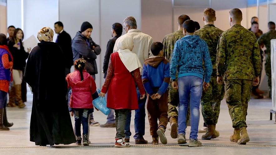PRO/CON: Can U.S. governors say no to Syrian refugees? By Tribune News Service, adapted by Newsela staff on 12.18.15 Word Count 1,394 Syrian refugees wait at Marka Airport in Amman, Jordan, on Dec.