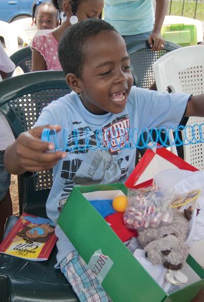 BELIZE: Children love to discover simple toys like Slinkies and cuddly stuffed animals packed in their shoe box gifts.