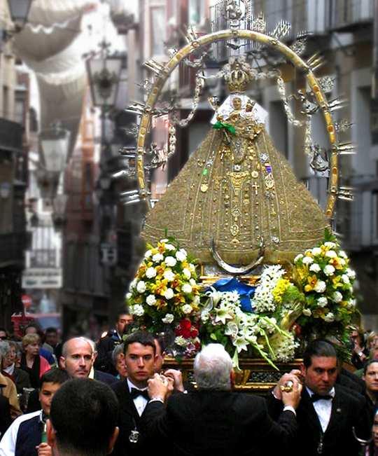 An image of Mary is processed through the narrow streets of Toledo, Spain during the month of May, 2006.
