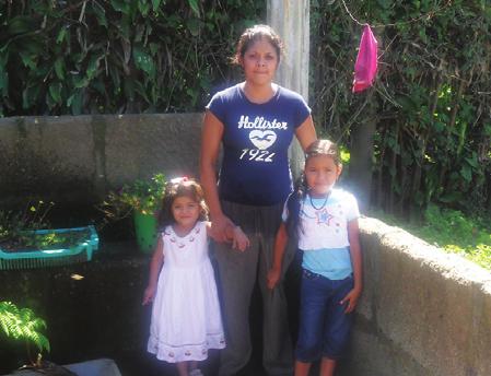 Ana, her husband Oscar, and their two children are so thankful for their new home (see page 7).