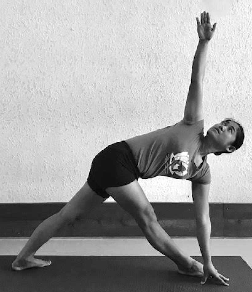 Parivrtta Trikonasana Revolved Triangle Pose Step the right foot forward and left leg back.