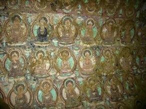 Buddha surrounded by other