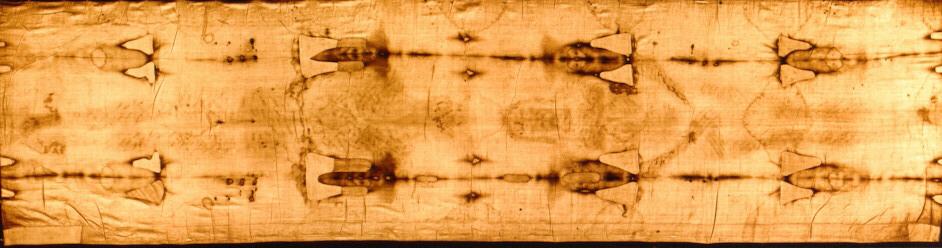 Turin Shroud Facts First photographed 1898 by Secundo Pia. The image on the cloth is a negative. The radiation that made the body image was up and down parallel to gravity, no side image.