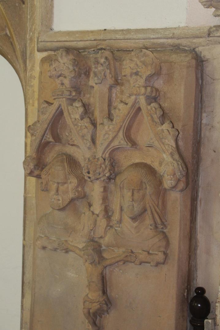 An early 14 th century coffin lid, featuring a cross of thorn thought to suggest an