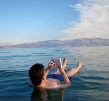 Swim at the Dead Sea The Dead Sea, which shimmers like a blue mirror under all-day sunshine, is one of the most unusual bodies of water in the world.