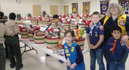 We could not complete this Annual Christmas Cheer Food Basket project without help from the Scouts.