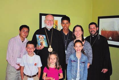 His Grace, Bp. JOSEPH, took time in July to visit with Fr. Michael Nasser, his family, and several of the young men from St.