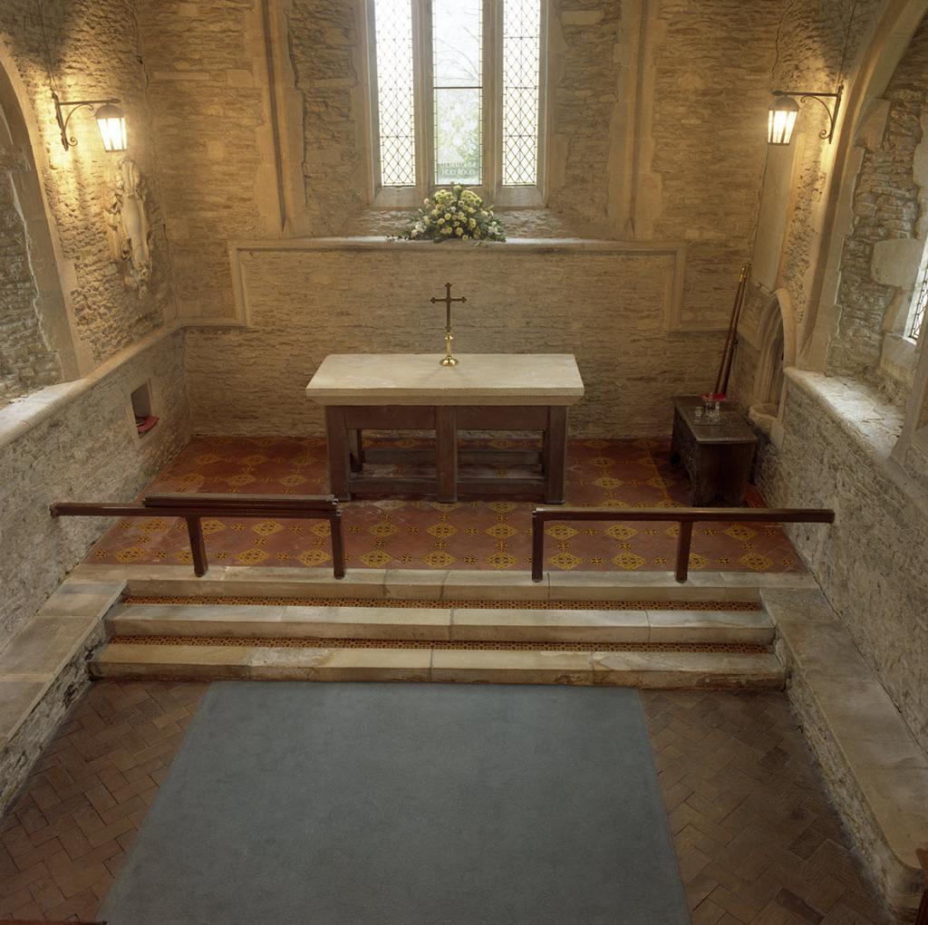 The rounded string course around the walls of the Chancel, and forming the window sills, has original 13 th Century rubble stonework below it.