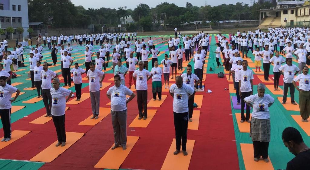 June Dignitaries performing Yoga at Wadia college