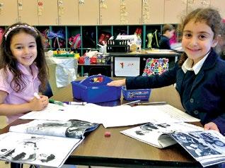 The children work in small differentiated groups with both fiction and nonfiction texts.