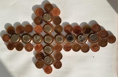 For the final cross, join all the coins together to make a massive cross.