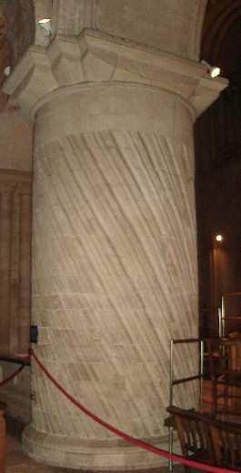 A column is round in shape (cylindrical).