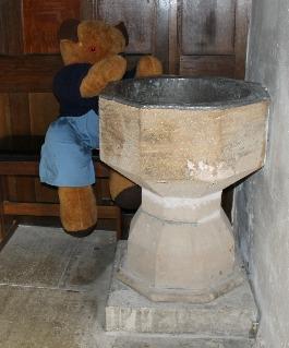 1. Font The Pilgrims Trail Teddy Horsley opens the door into the church.