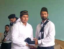 Members who are joining Ahmadiyya Muslim Youth were awarded with Khuddam Scarf s as a sign of unity, identity and respect.