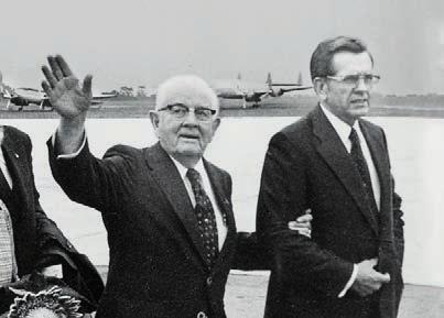 Opposite page: Known for teaching from the scriptures, then-elder Packer meets with fellow Apostles Elder James E. Faust (left) and Elder Dallin H. Oaks in 1987.