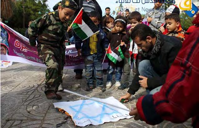 11 Kindergarten children in the Square of the Unknown Soldier in Gaza City participate in